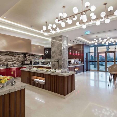 Hotel Doubletree By Hilton Skopie Exterior foto The Kitchen Table