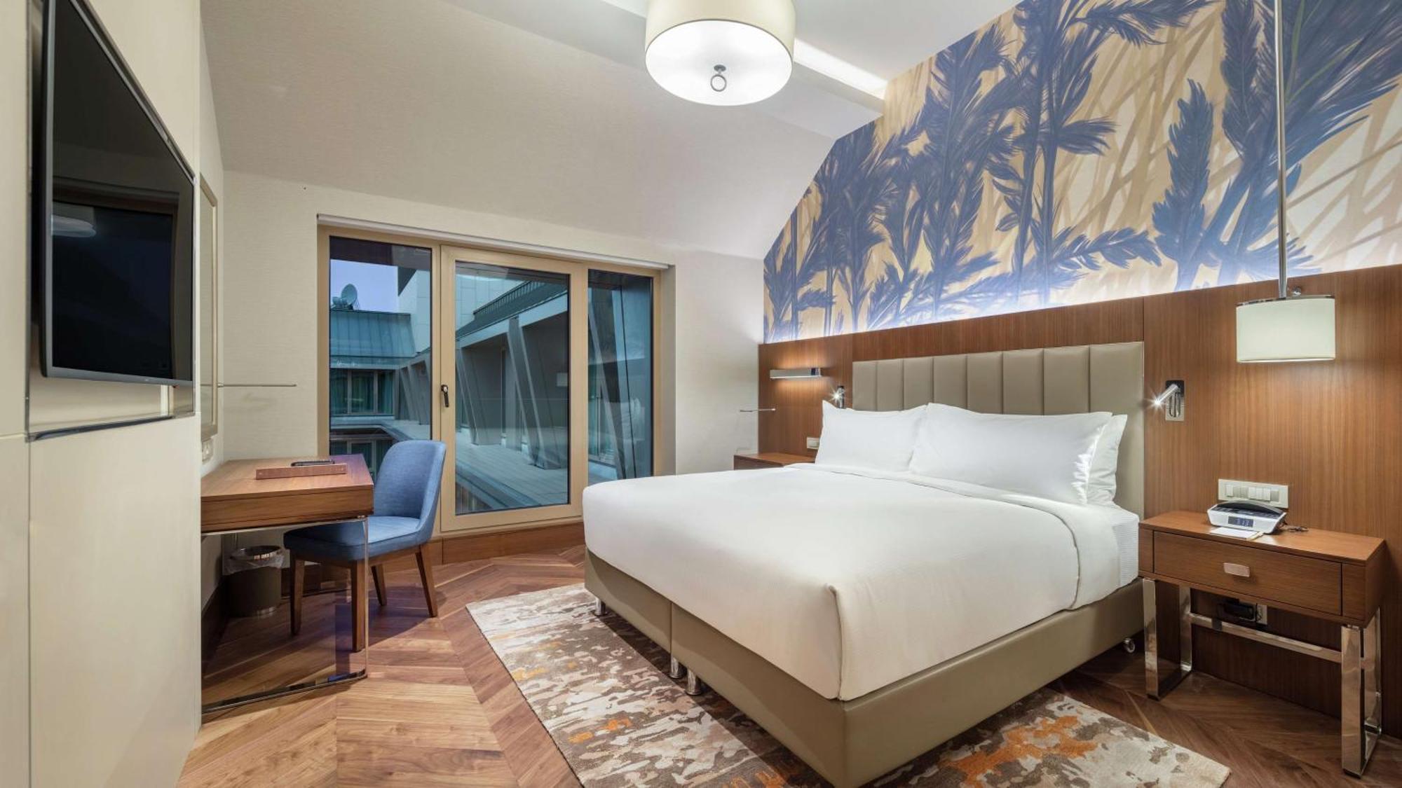 Hotel Doubletree By Hilton Skopie Exterior foto A bedroom at the hotel