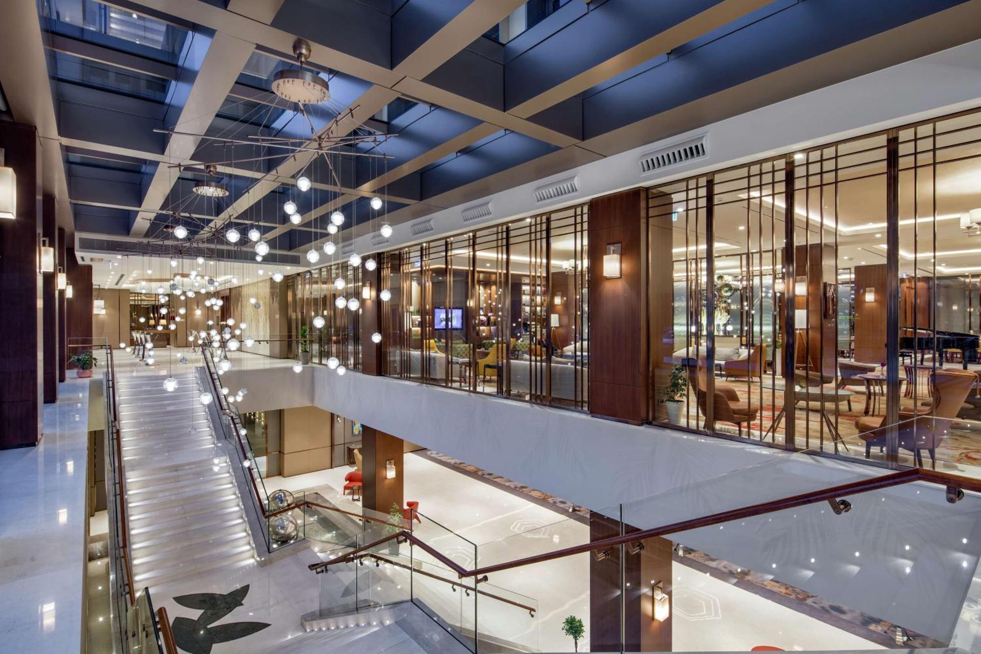 Hotel Doubletree By Hilton Skopie Exterior foto The interior of the hotel